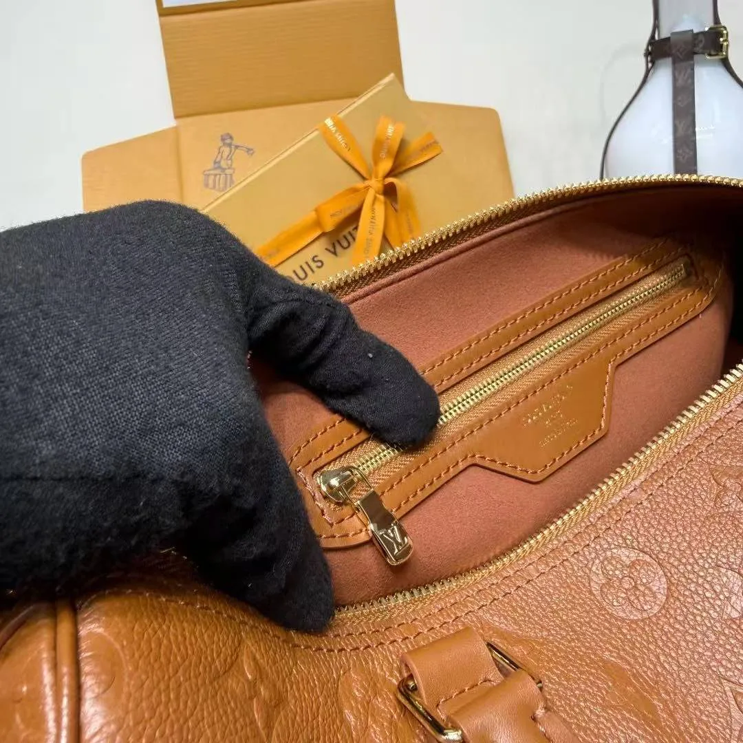 M28662 Speedy Soft 30 Monogram Empreinte Leather Handbag