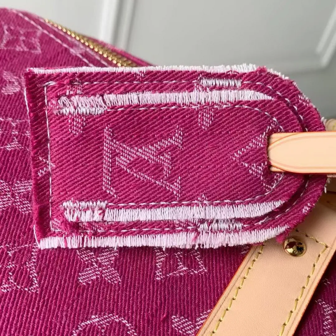 M27944 Keepall Bandoulière 45 Fuchsia Denim Monogram Denim