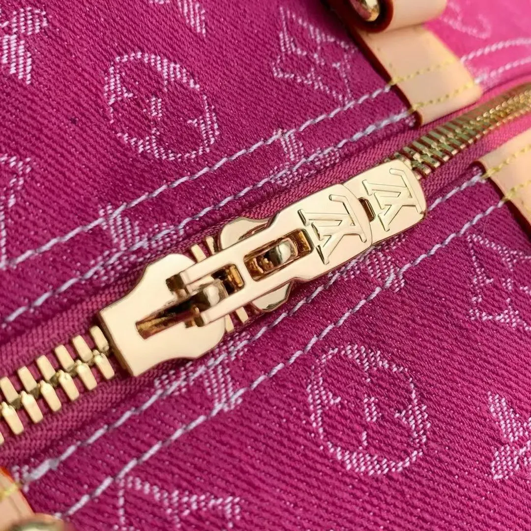 M27944 Keepall Bandoulière 45 Fuchsia Denim Monogram Denim