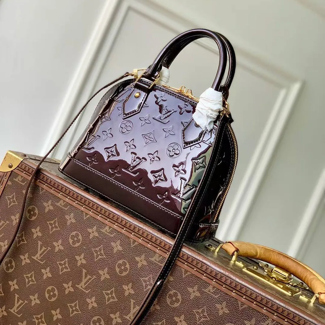 M27172 Alma BB Datewood Varnished Cowhide Leather