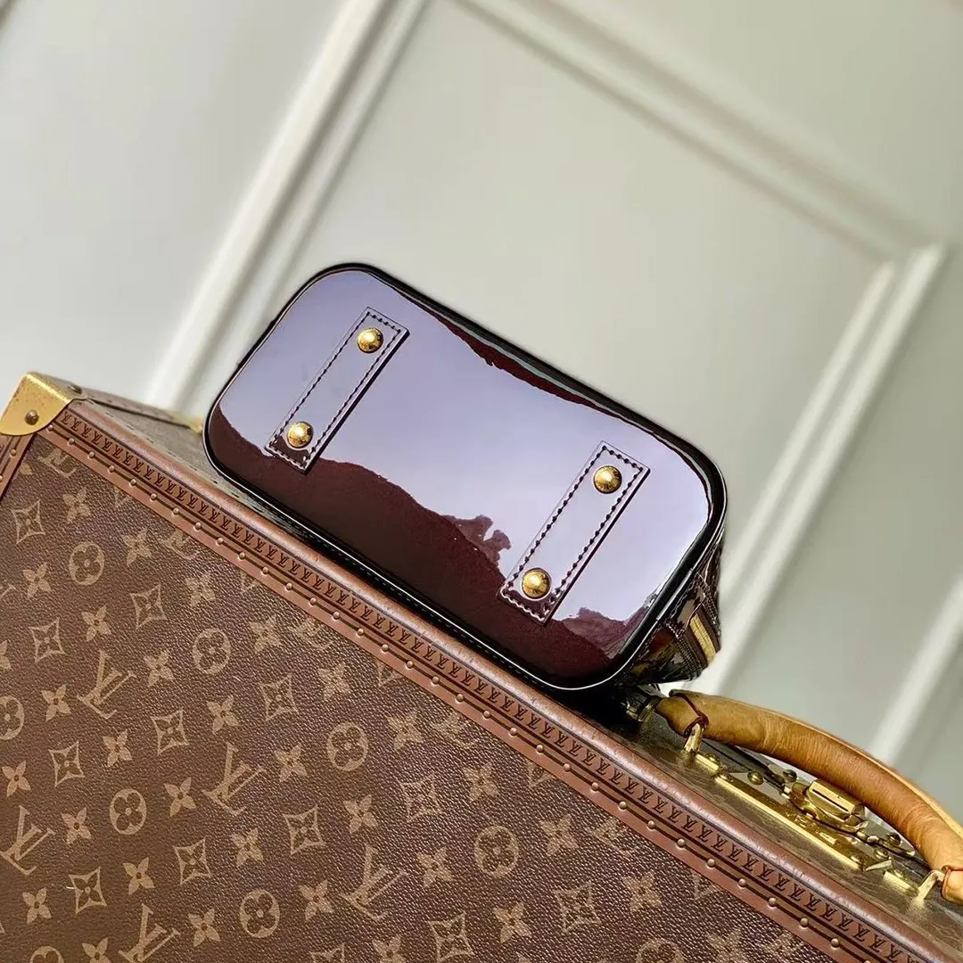 M27172 Alma BB Datewood Varnished Cowhide Leather