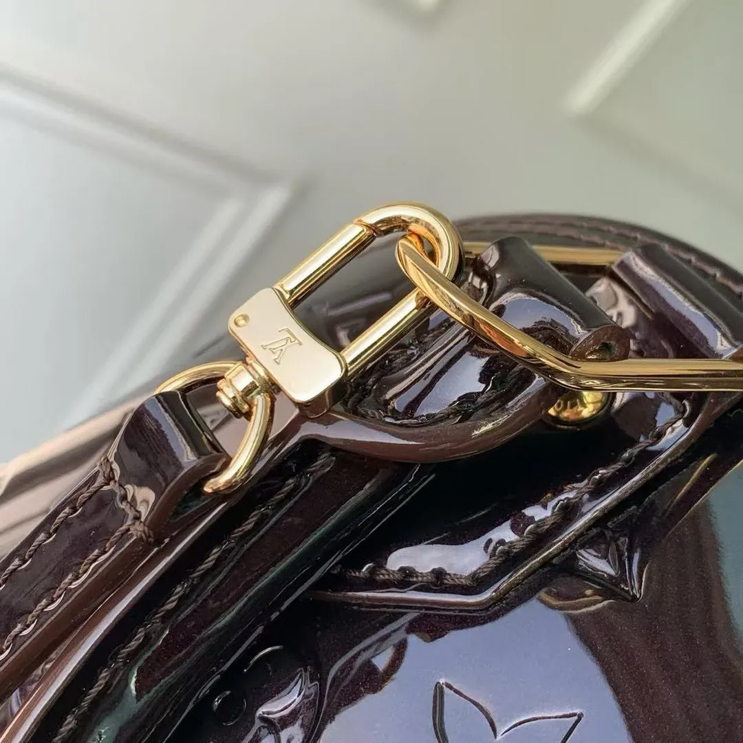M27172 Alma BB Datewood Varnished Cowhide Leather