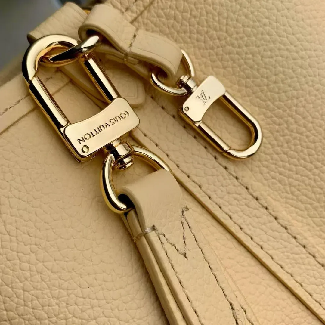 M29228 Reversible Neverfull Bandoulière Inside Out BB Monogram Banane Cowhide Leather Monogram Coated Canvas