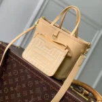M29228 Reversible Neverfull Bandoulière Inside Out BB Monogram Banane Cowhide Leather Monogram Coated Canvas - M28336 2 M29228 Reversible Neverfull Bandoulière Inside Out BB Monogram Banane Cowhide Leather Monogram Coated Canvas