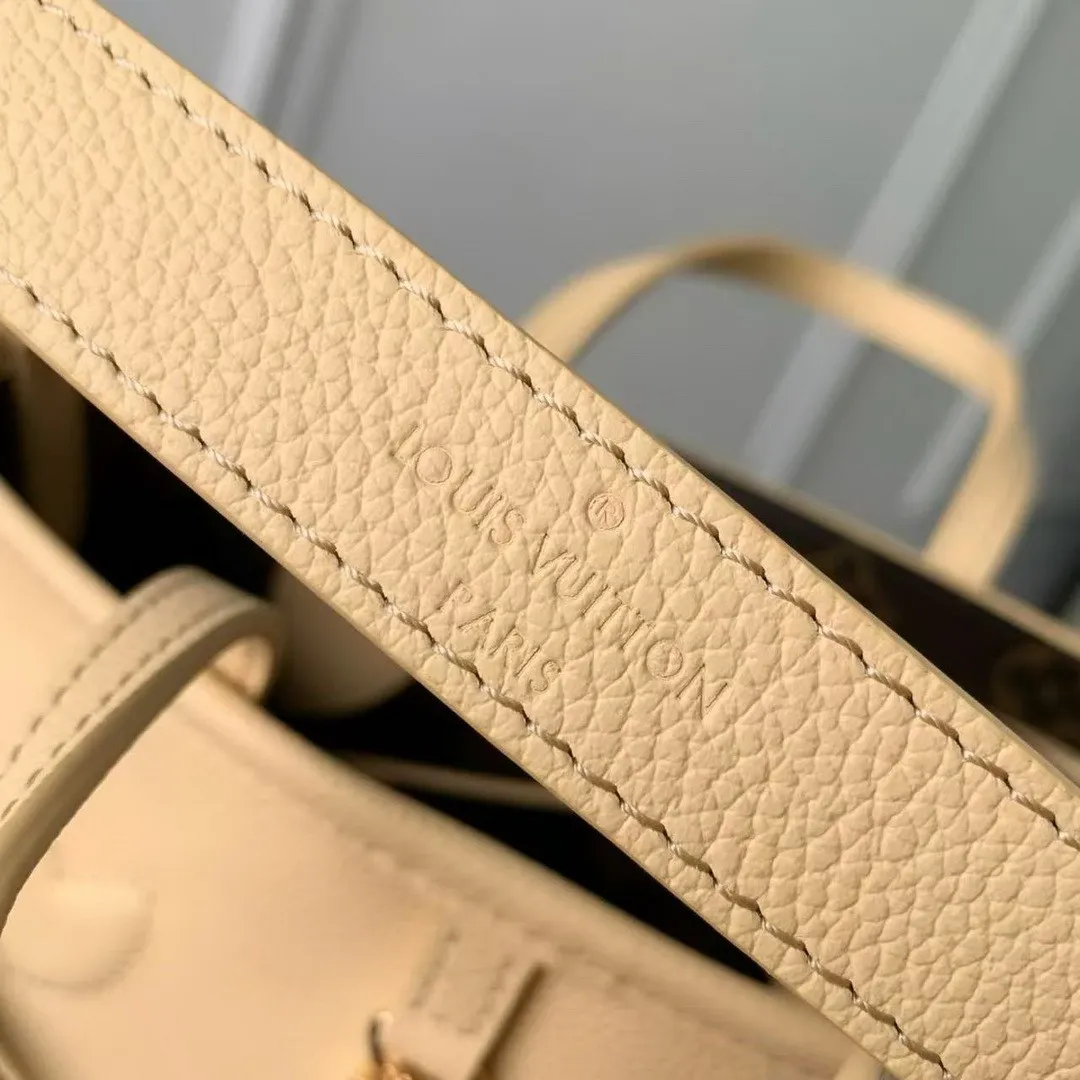 M29228 Reversible Neverfull Bandoulière Inside Out BB Monogram Banane Cowhide Leather Monogram Coated Canvas