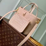 M25657 Reversible Neverfull Bandoulière Inside Out BB Monogram Limestone Cowhide Leather Monogram Coated Canvas - M28761 2 M25657 Reversible Neverfull Bandoulière Inside Out BB Monogram Limestone Cowhide Leather Monogram Coated Canvas