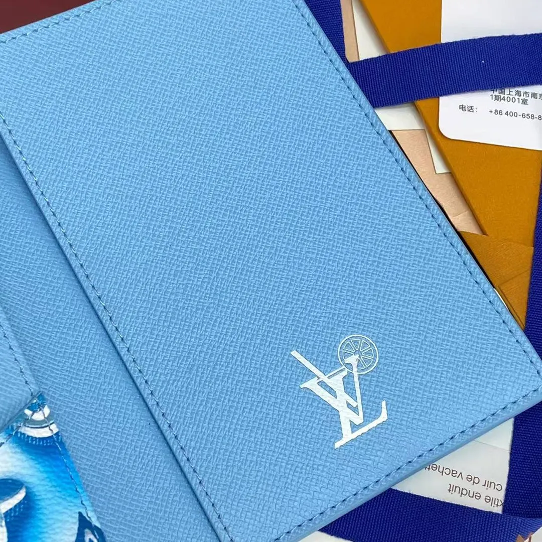 M28593 Passport Cover Frozen Blueberry Blue Travel Accessories Monogram Heritage Monogram Ice Cubes Coated Canvas