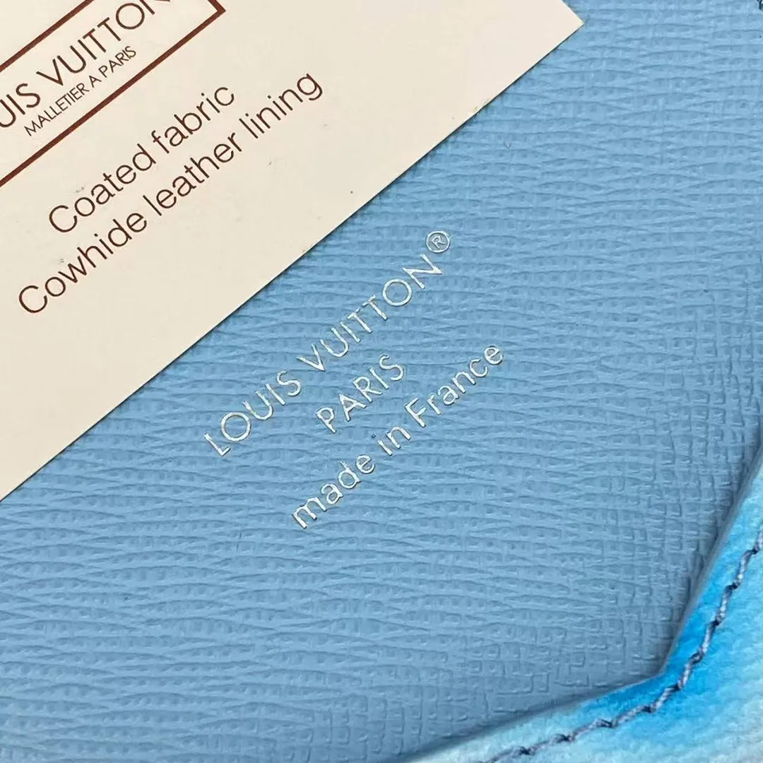 M28593 Passport Cover Frozen Blueberry Blue Travel Accessories Monogram Heritage Monogram Ice Cubes Coated Canvas
