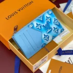 M28626 Coin Card Holder Frozen Blueberry Blue Travel Accessories Monogram Heritage Monogram Ice Cubes Coated Canvas - M28622 2 M28626 Coin Card Holder Frozen Blueberry Blue Travel Accessories Monogram Heritage Monogram Ice Cubes Coated Canvas