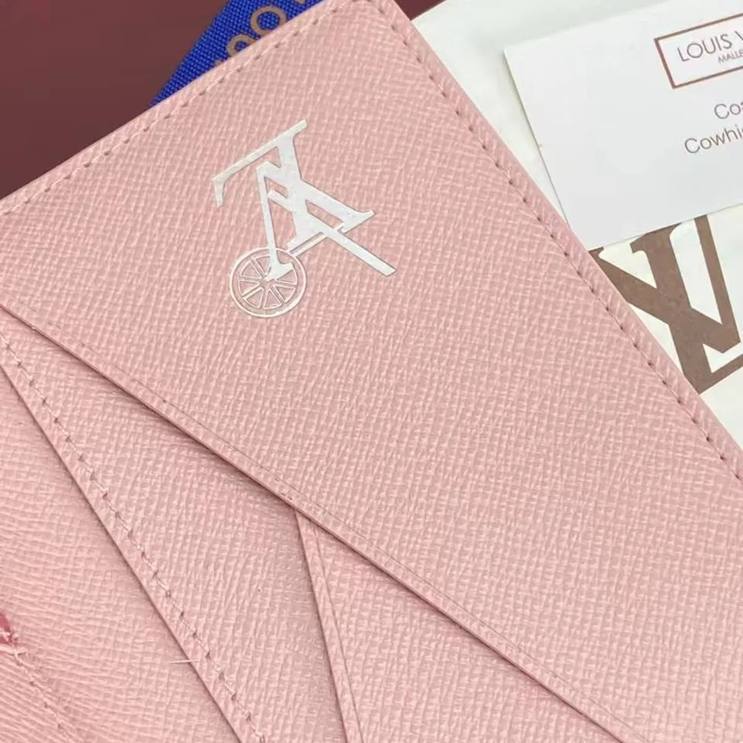 M28625 Pocket Organizer Frozen Cotton Candy Pink Travel Accessories Monogram Heritage Monogram Ice Cubes Coated Canvas