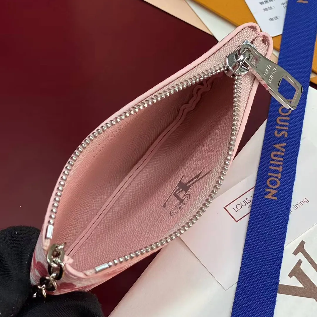 M28665 Pochette Clés XS Frozen Cotton Candy Pink Travel Accessories Monogram Heritage Monogram Ice Cubes Coated Canvas