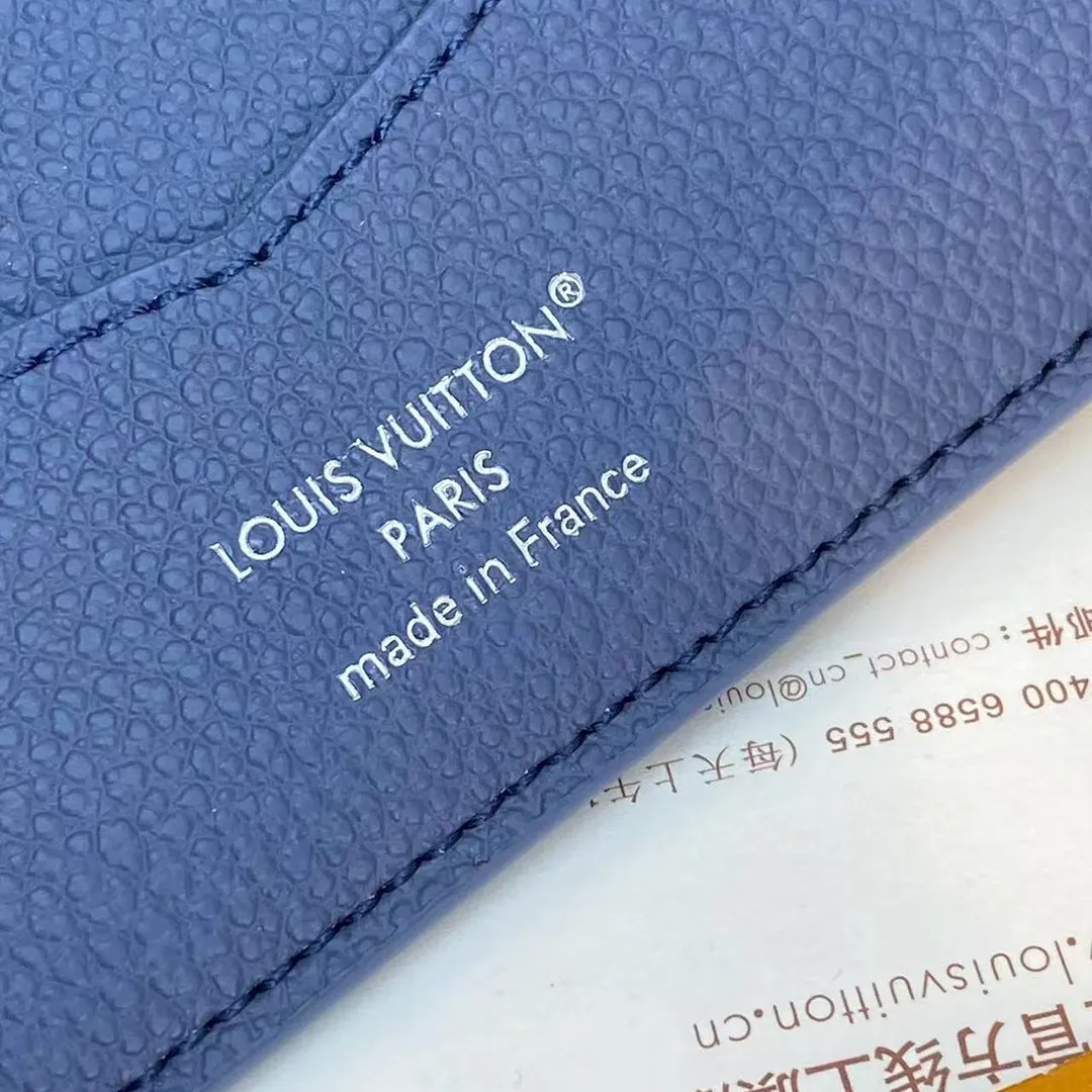 M28591 Slender Wallet Indigo Blue Damoflage Coated Canvas