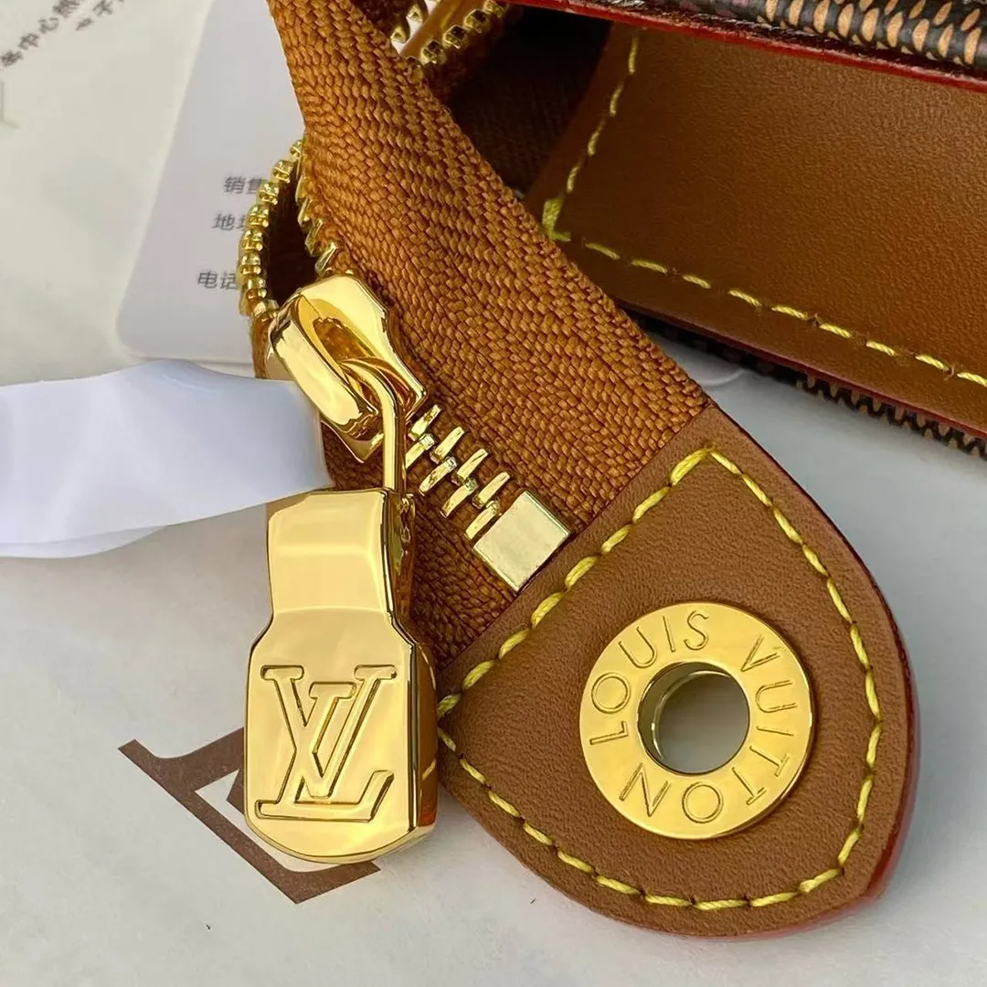 N40897 Pochette Voyage MM x The Darjeeling Limited Brown Damier Ebene Heritage Coated Canvas