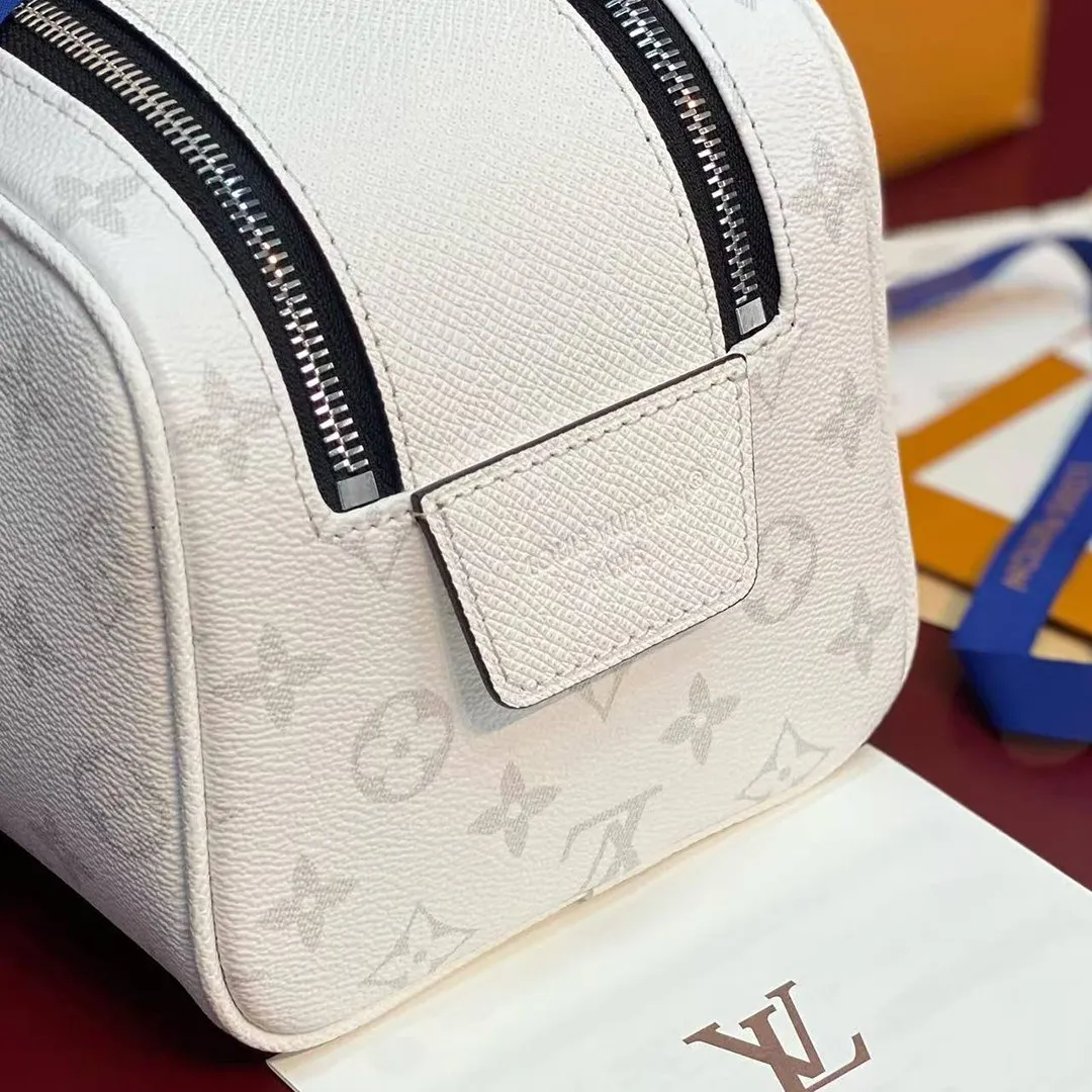 M27794 Dopp Kit Optic White Monogram Coated Canvas