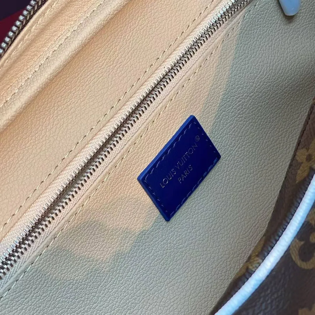 M28371 Mini Dopp Kit Monogram Coated Canvas