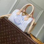 M28668 Speedy Bandoulière 20 Blue Monogram Coated Canvas - M03812 1 M28668 Speedy Bandoulière 20 Blue Monogram Coated Canvas
