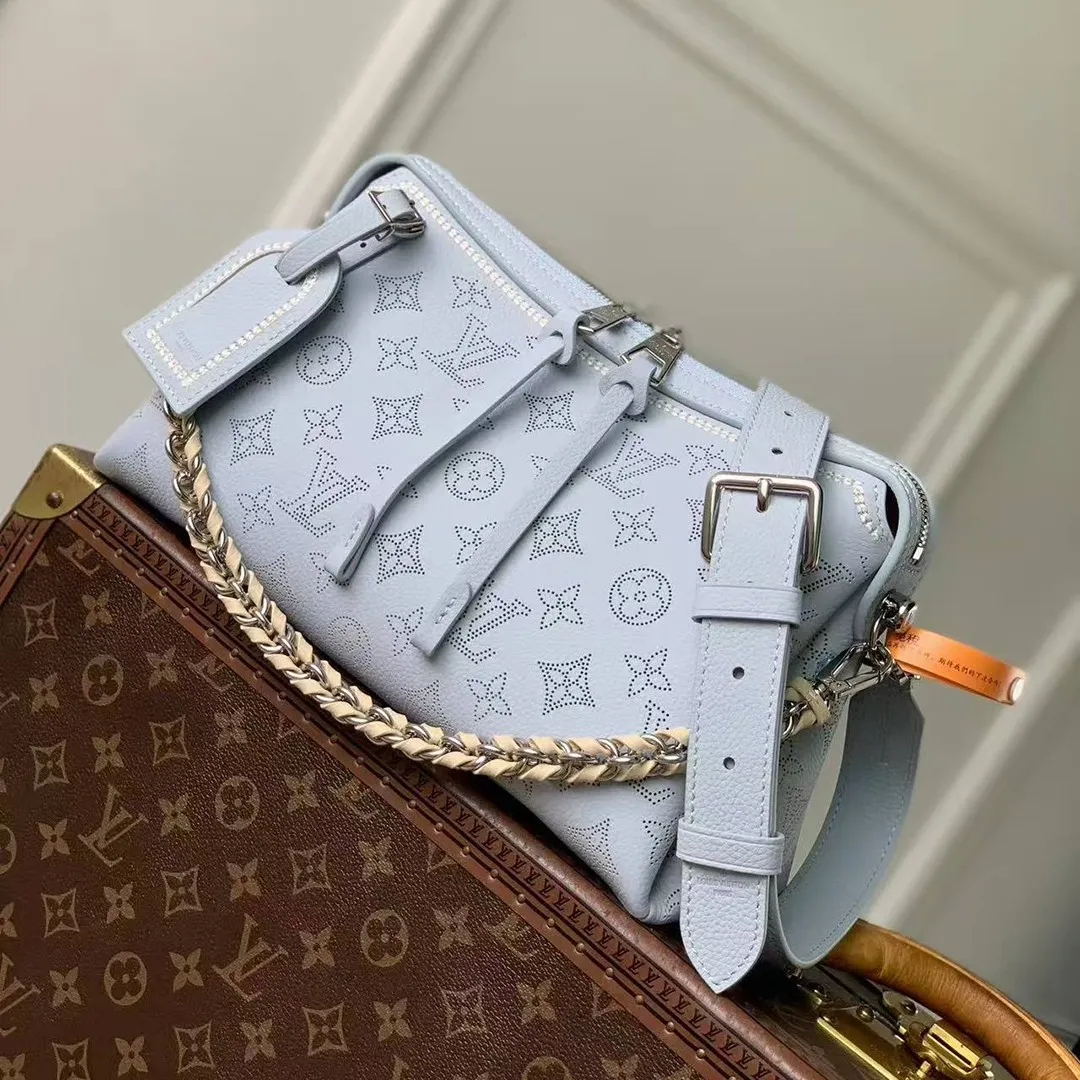 M29317 Hand It All PM Handbag Bleu Olympe Perforated Mahina Calfskin Leather With Embroidery