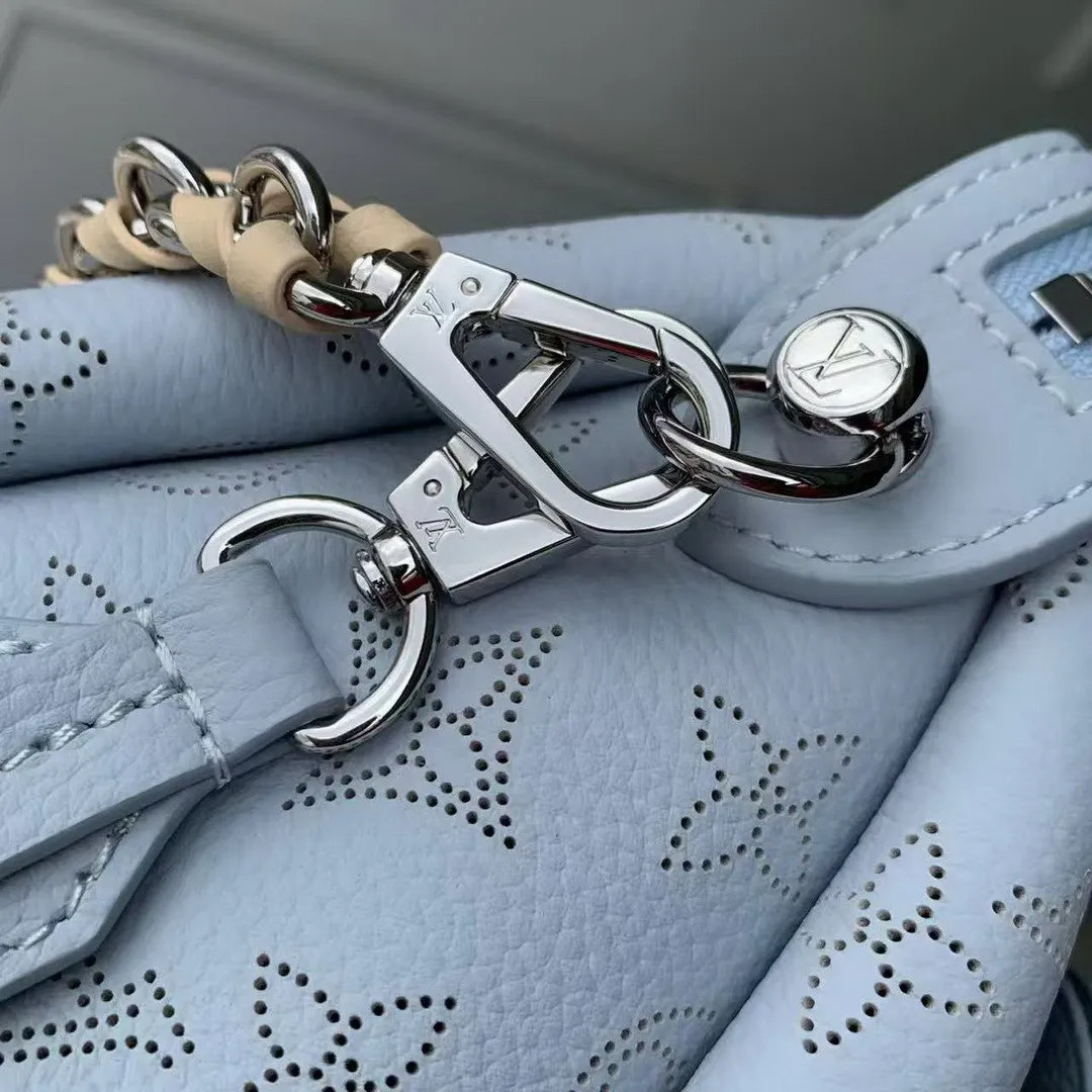 M29317 Hand It All PM Handbag Bleu Olympe Perforated Mahina Calfskin Leather With Embroidery