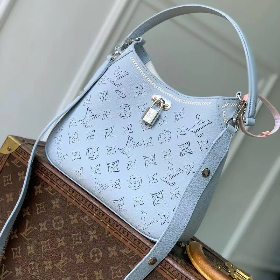 M28779 All Around PM Handbag Bleu Olympe Perforated Mahina Calfskin Leather With Embroidery