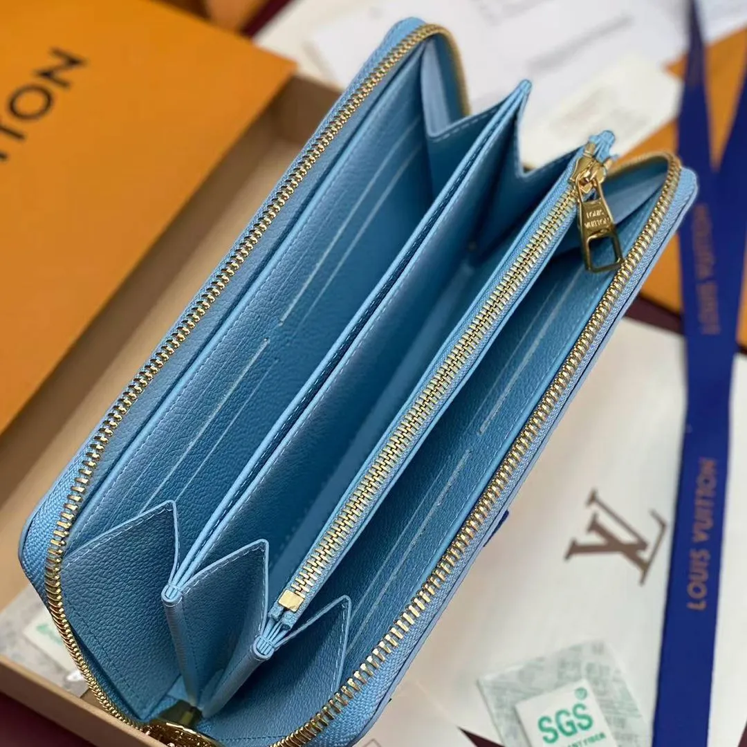 M28294 Zippy Wallet Grape Blue Monogram Empreinte Leather