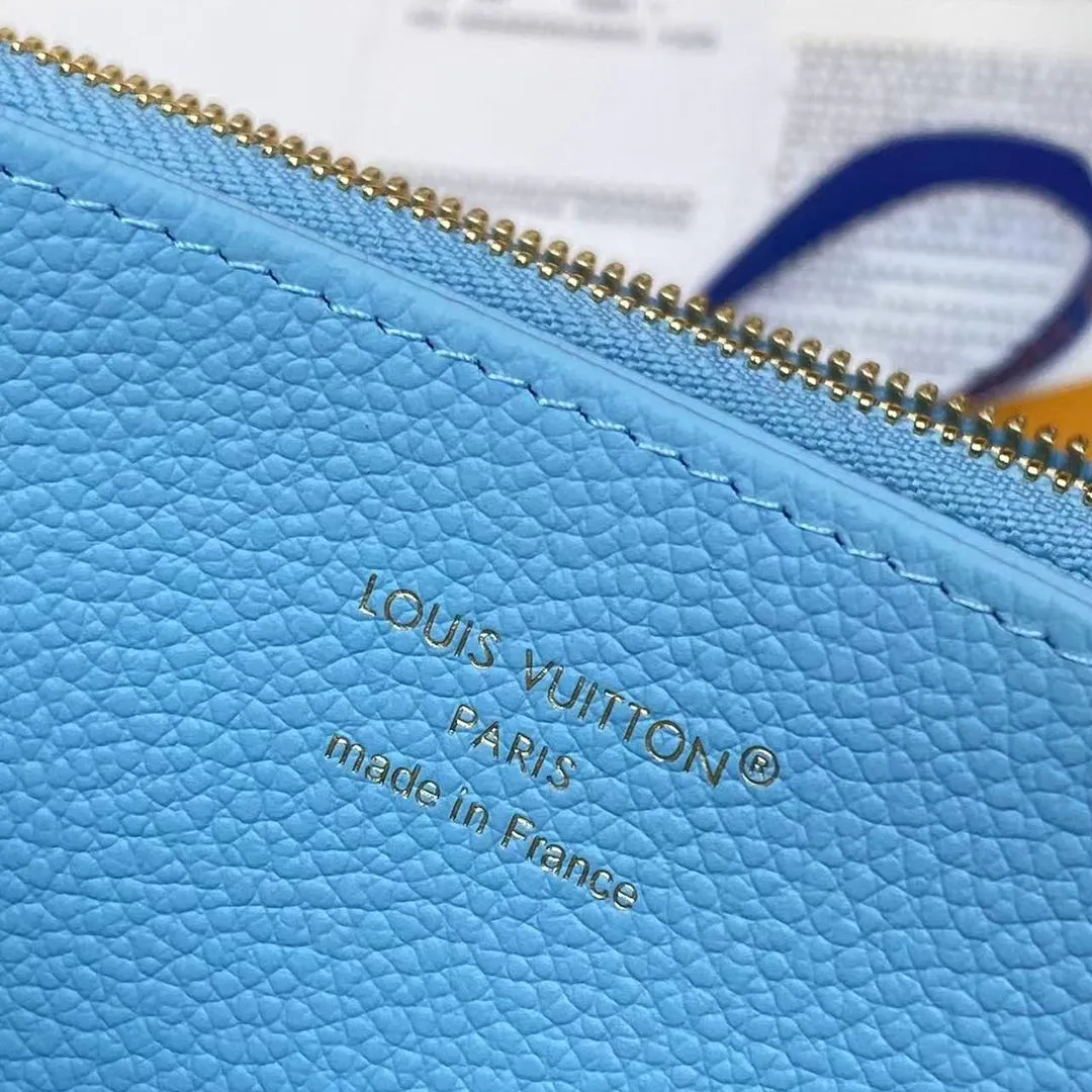 M28294 Zippy Wallet Grape Blue Monogram Empreinte Leather