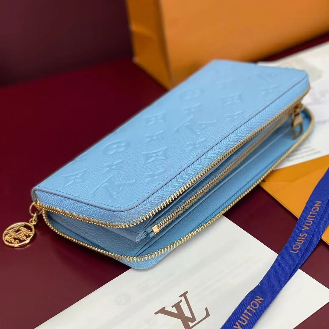 M28294 Zippy Wallet Grape Blue Monogram Empreinte Leather