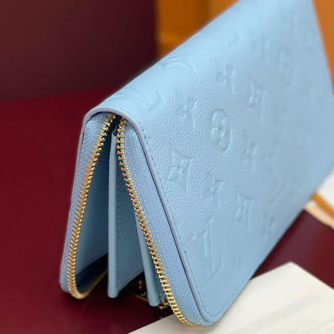 M28294 Zippy Wallet Grape Blue Monogram Empreinte Leather