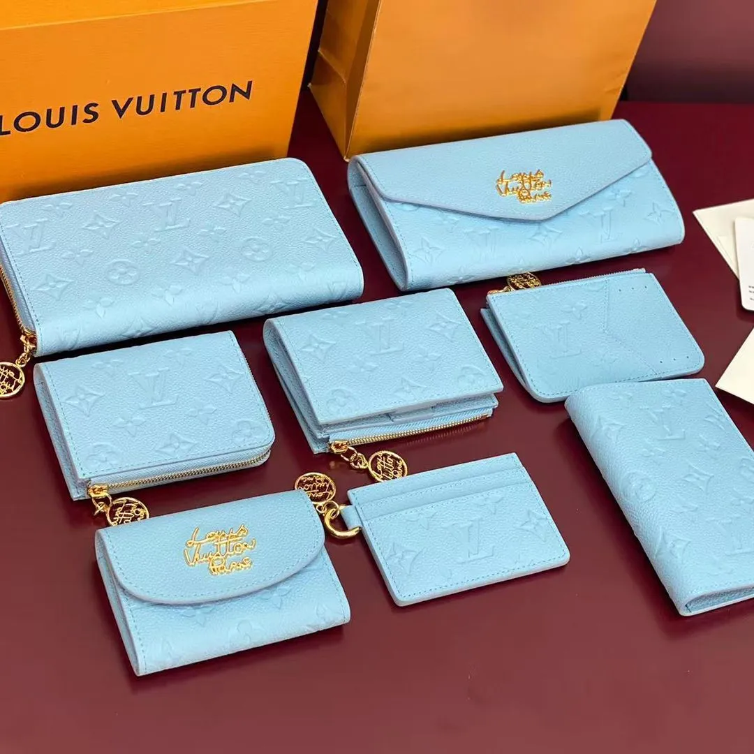 M28294 Zippy Wallet Grape Blue Monogram Empreinte Leather