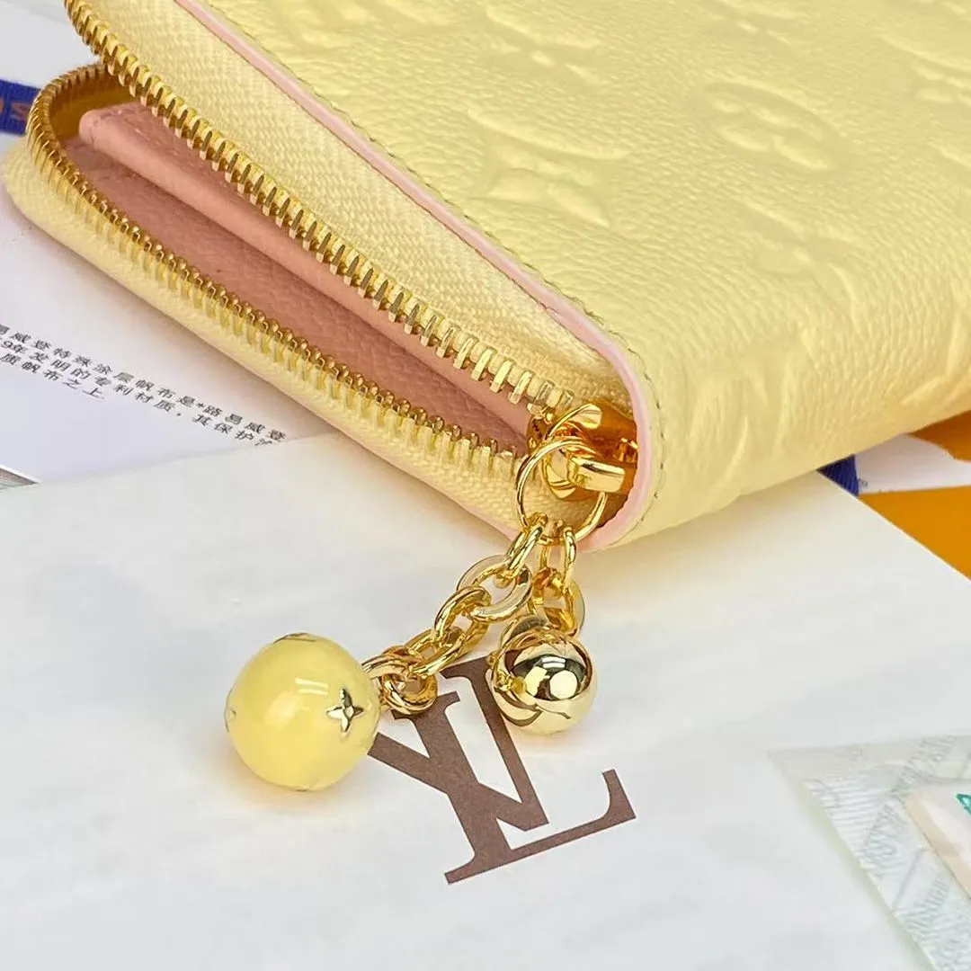M28969 Zippy Wallet Banana Monogram Empreinte Leather