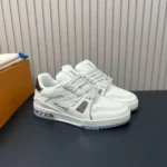 1AKCKV L.V Trainer Sneaker Gray Monogram Debossed Grained Calf Leather - 1AK5BB 2 1AKCKV L.V Trainer Sneaker Gray Monogram Debossed Grained Calf Leather