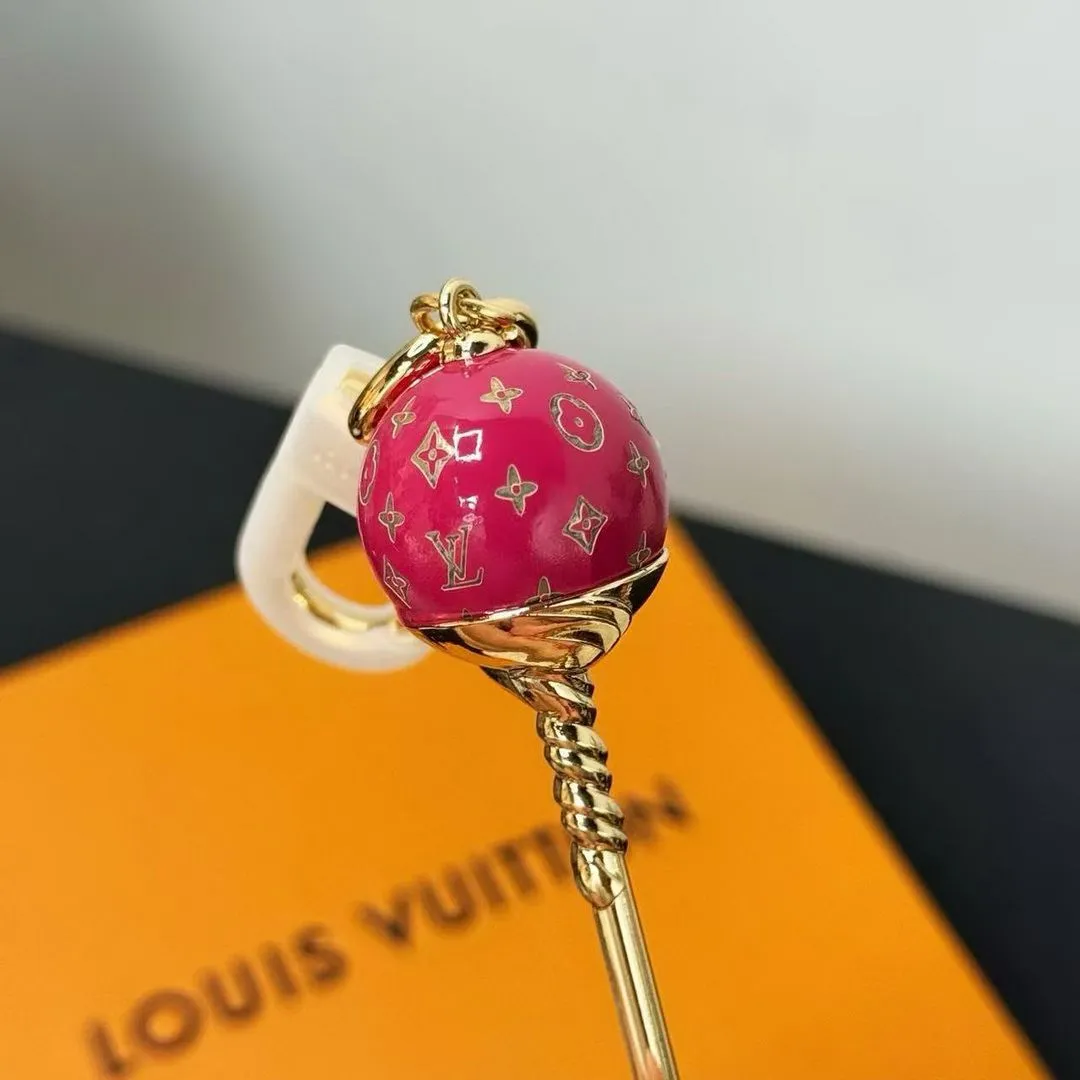 M03519 L.V Sweets Bag Charm Orange Monogram Pad Printing Gold-toned Metal