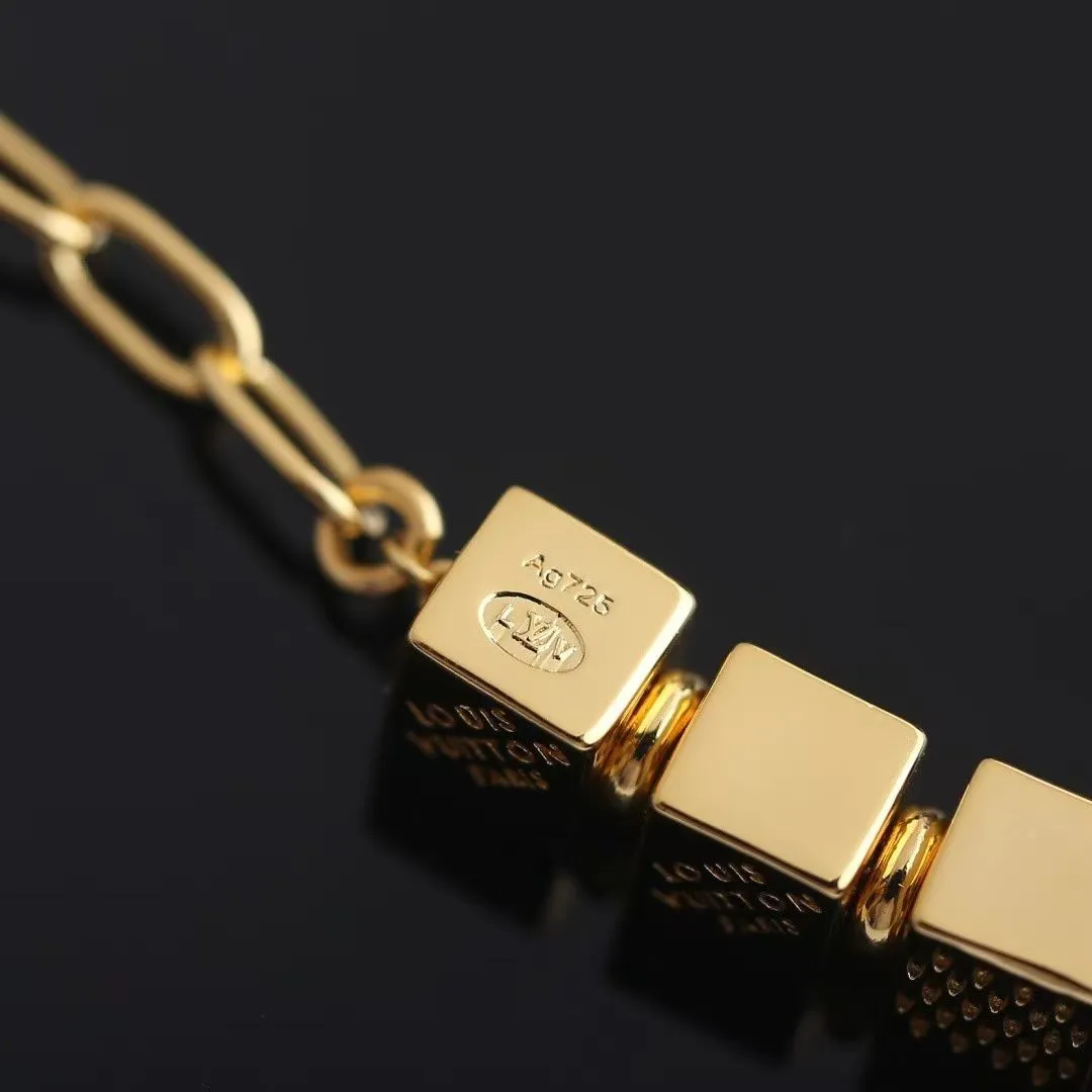 MA024A L.V Cube Bracelet Gold-toned Metal
